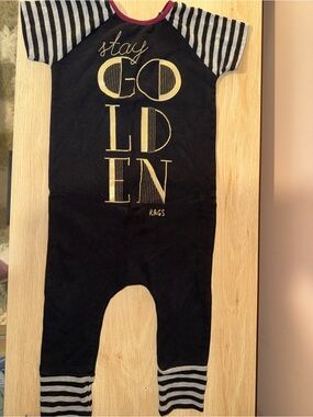Rags to Raches Black One-Piece with Gold Lettering and Gray Stripes